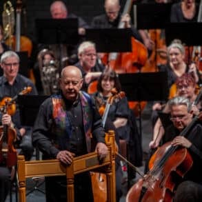 Musicians playing on stage at the Symphony Orchestra concert