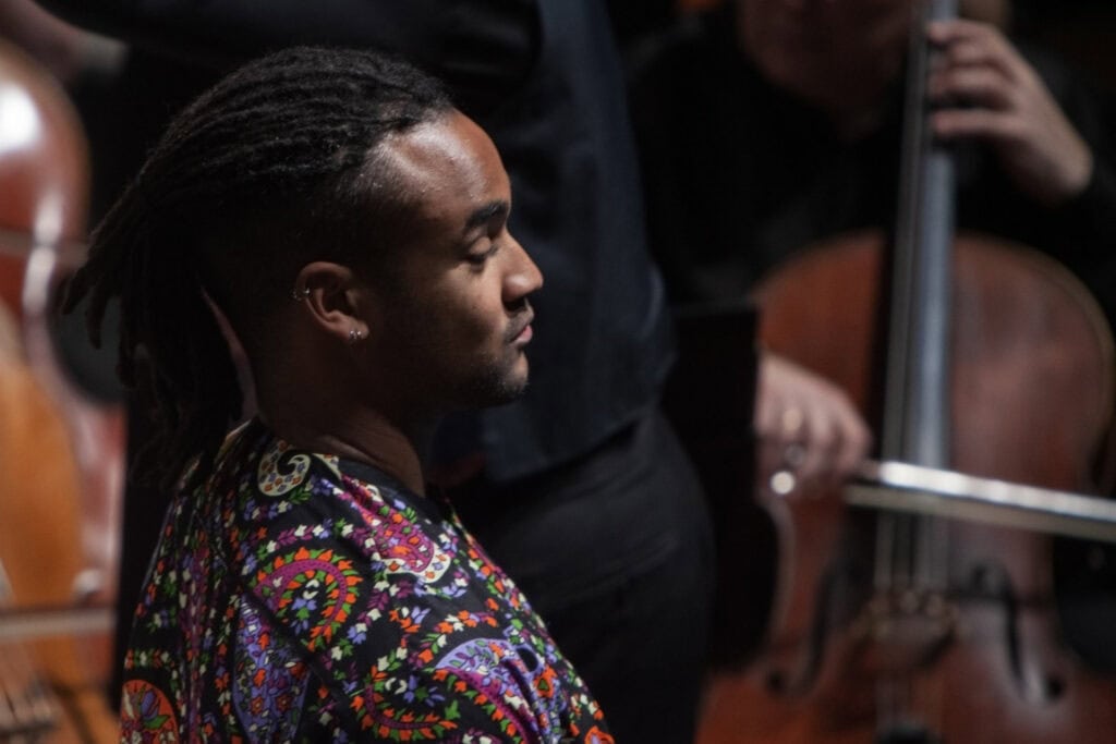 Musicians playing on stage at the Symphony Orchestra concert