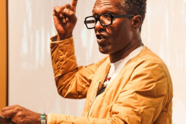 Lemn Sissay presenting a talk