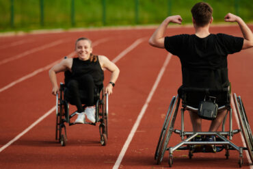 An inspiring couple with disability showcase their incredible determination and strength as they train together for the Paralympics pushing their wheelchairs in marathon track.