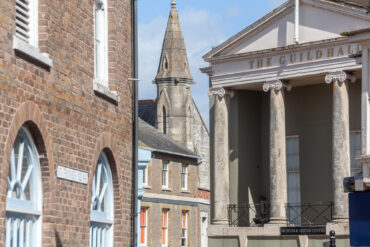 View of Newport Guildhall and church spire in the background