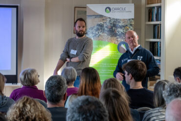 Seb Wilding-Taylor and Andrew Dean presenting a talk