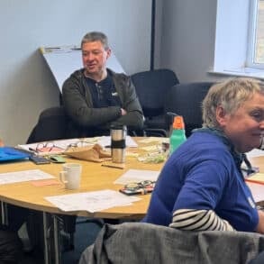 People sitting around a table during the Winter Gardens Workshop
