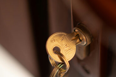 close up of keys in front door