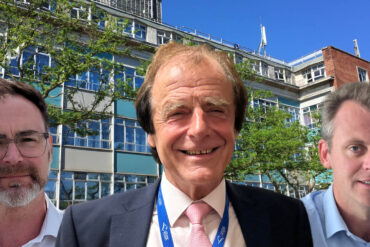 Richard Quigley, Phil Jordan and Joe Robertson with backdrop of County Hall