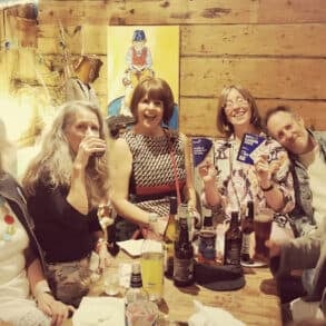 friends of Monkton Arts sitting around a table in the cafe