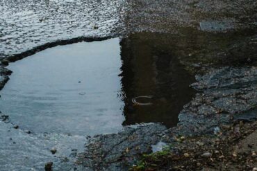 pothole filled with rain