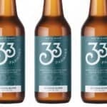Three bottles of the 33 parishes Biosphere blond beer