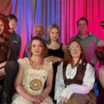Time Nor Tide CIC players in costume posing on stage