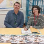 Daisy and Stephen signing books at Niton Primary School