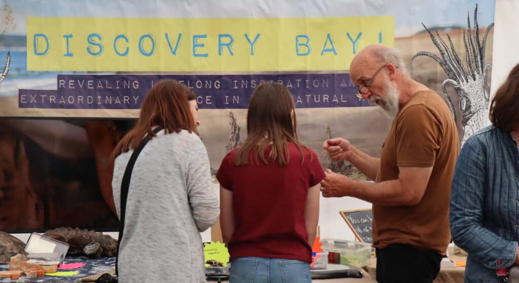 Ian Boyd talking to visitors to Hullabaloo about Sandown's science bay - Paul Coueslant
