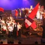Children on stage performing Les Miserables