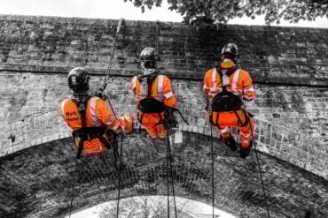 MMC Rope Access team hanging off Castle Rd Bridge in Wroxall