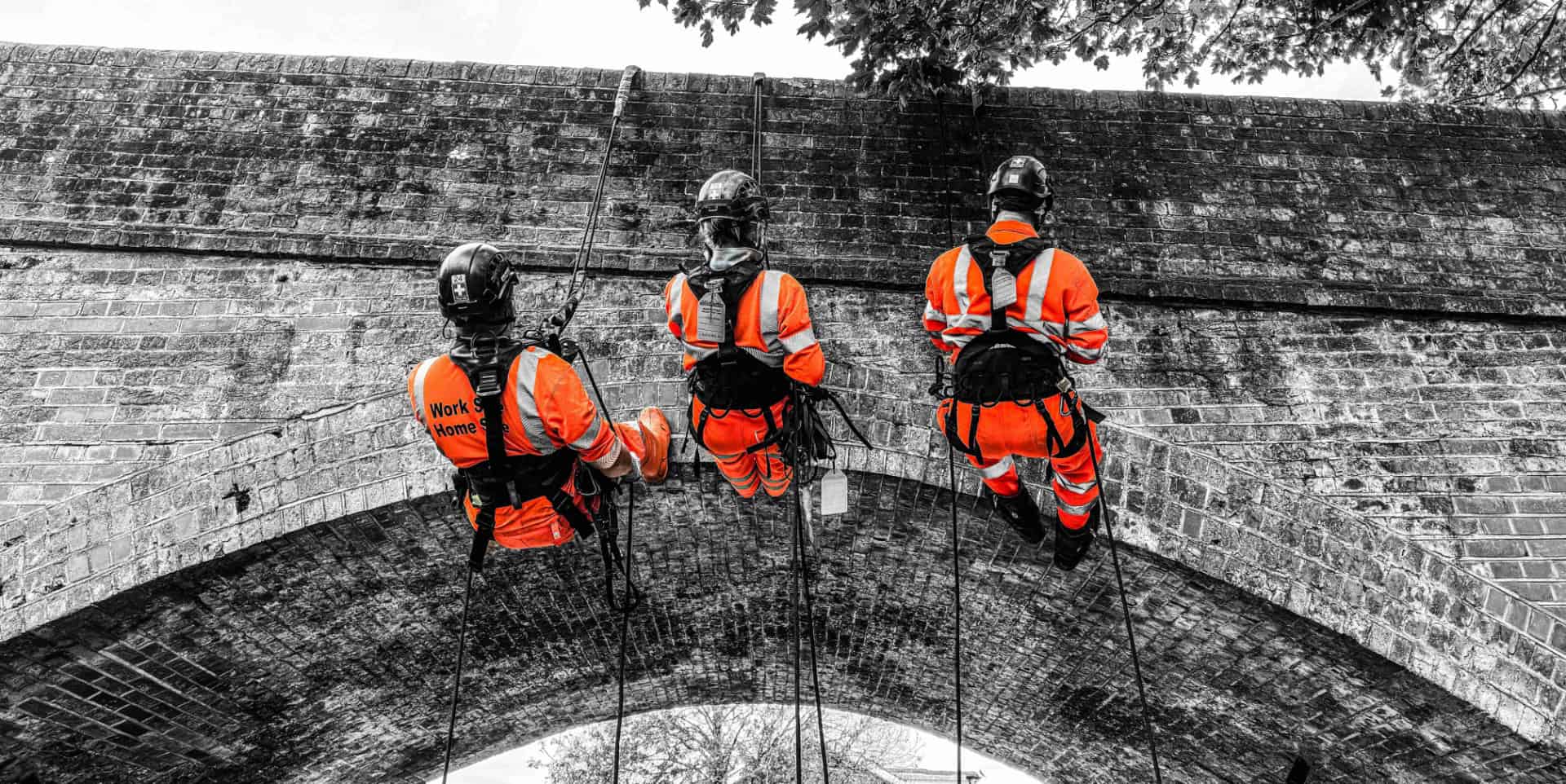 MMC Rope Access team hanging off Castle Rd Bridge in Wroxall