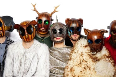 Members of FULU wearing animal masks