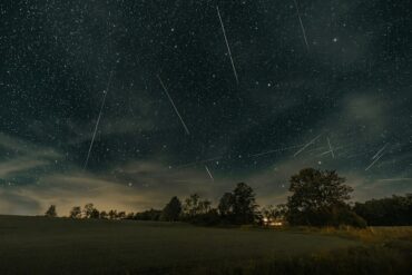 Meteor shower in the night sky