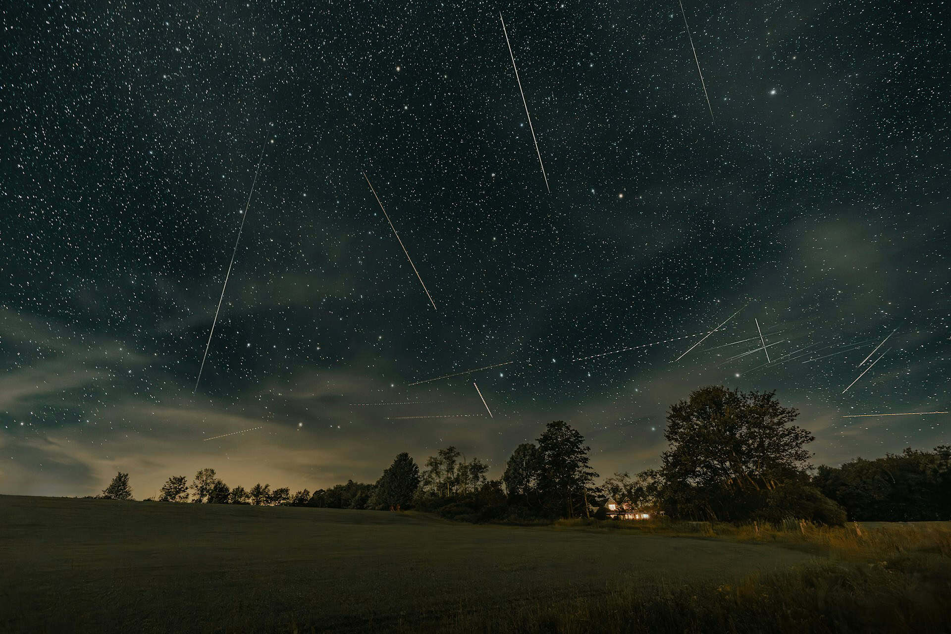 Meteor shower in the night sky