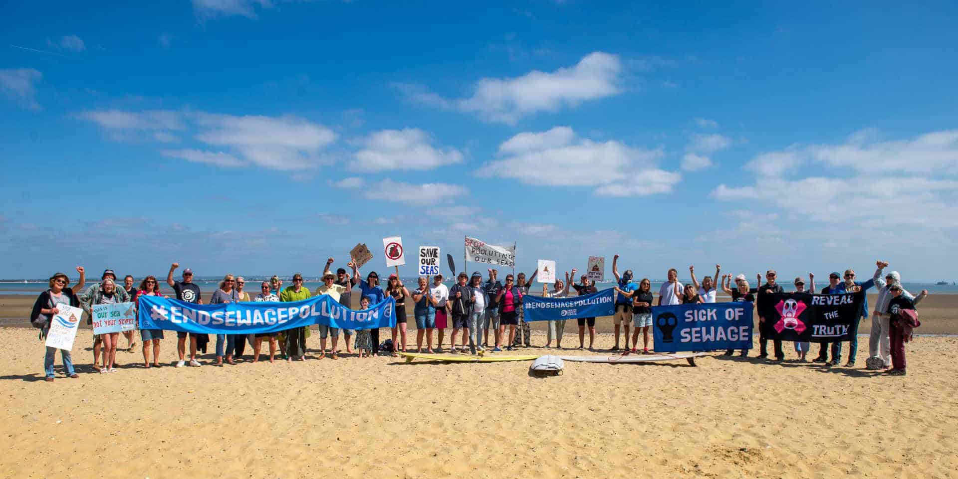 People at the Paddle Out Protest on Appley Beach in May 2025