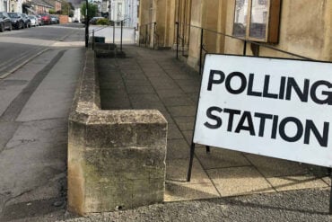 Polling station sign outside a church