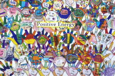 Positive energy artwork showing lots of painted hand outlines