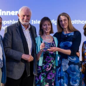 Volunteers and members of the Isle of Wight Parkinson’s Project Jim Foot, David Temple, Caroline Linton and Rebecca Verling, community physiotherapist, receive their Mali Jenkins Award from BBC Journalist Jane Hill