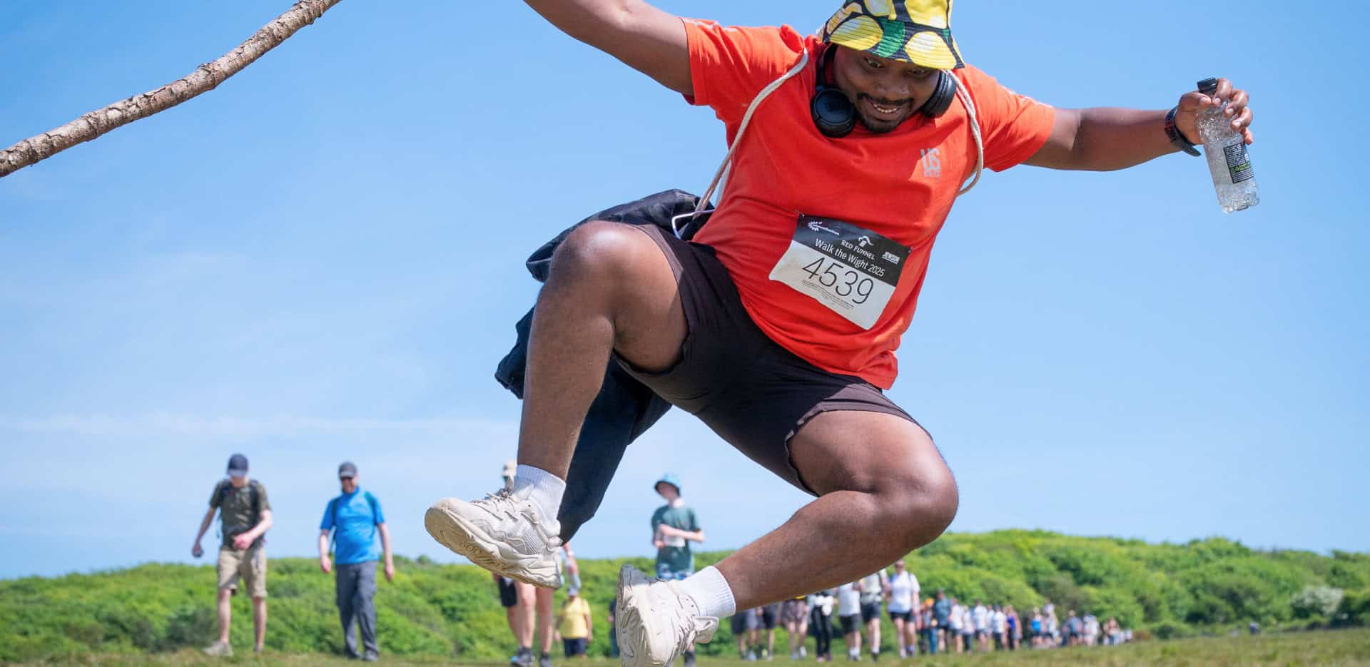 Walk the Wight walker jumping for joy