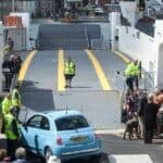 car loading on to the floating bridge on the first day of service