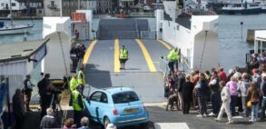 car loading on to the floating bridge on the first day of service