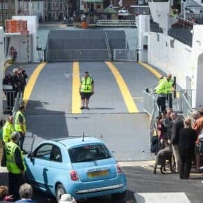 car loading on to the floating bridge on the first day of service