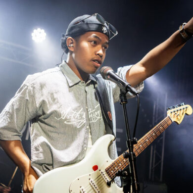 fugo kid performing on stage at strings venue