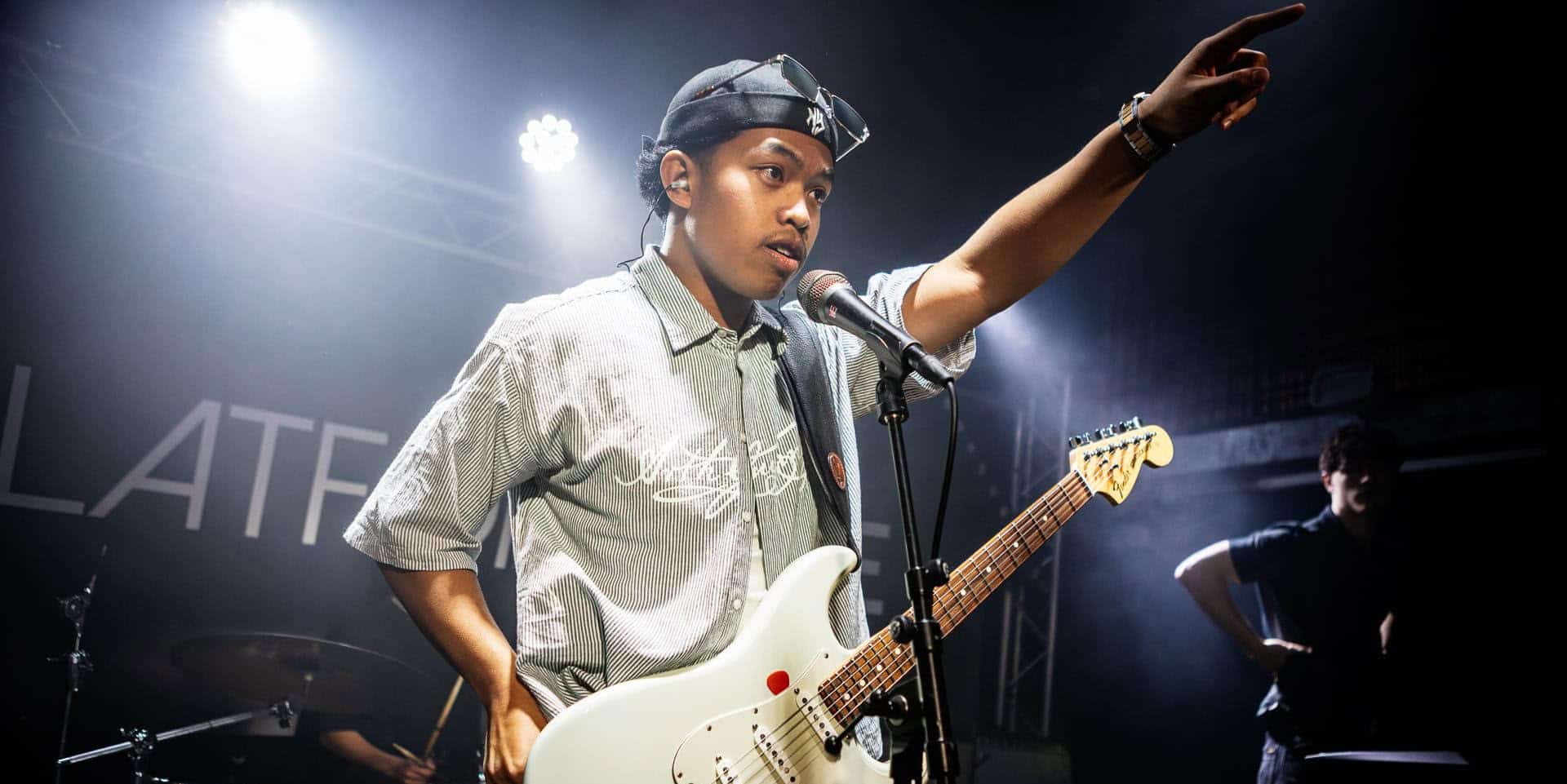 fugo kid performing on stage at strings venue