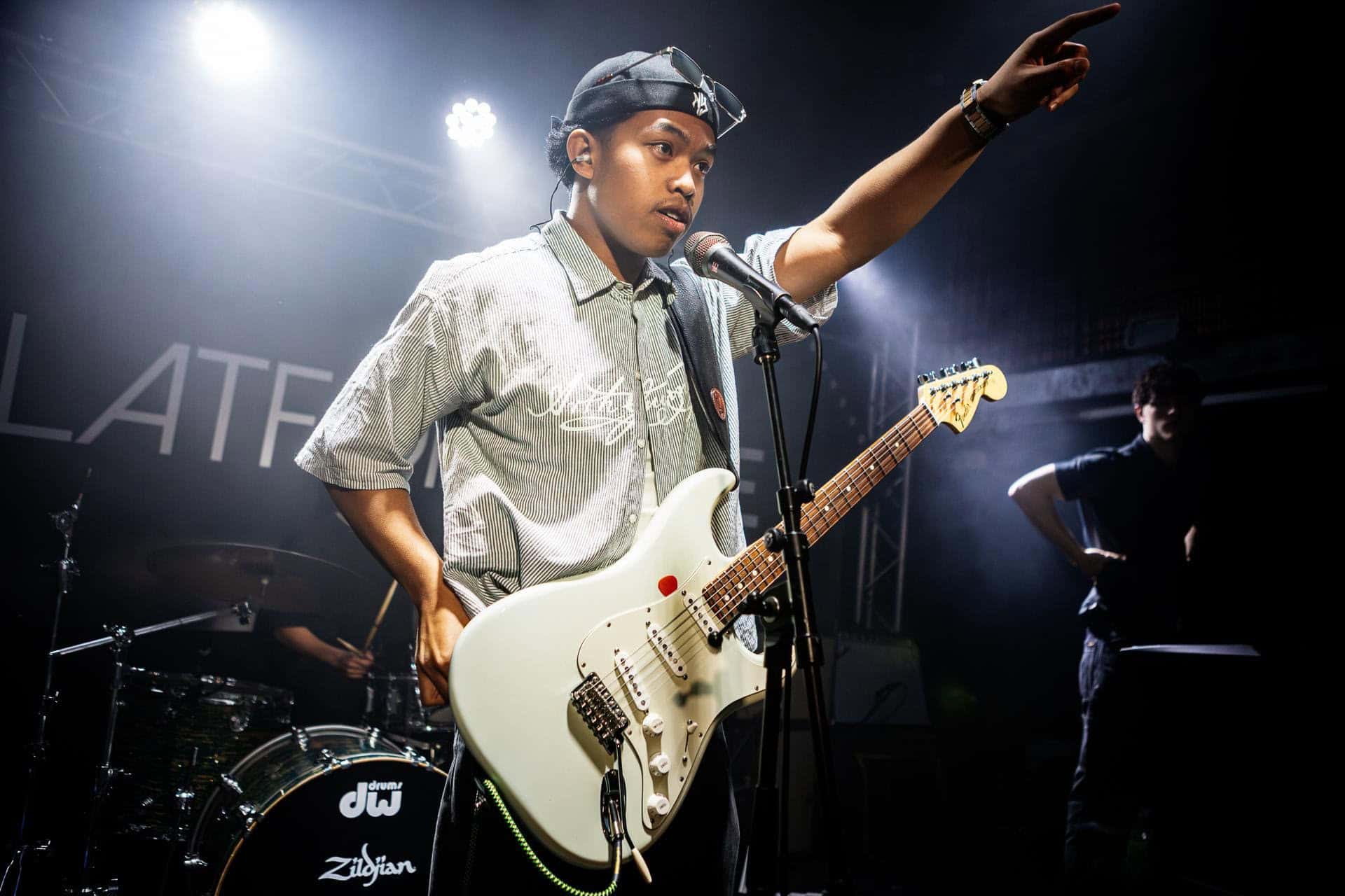 fugo kid performing on stage at strings venue