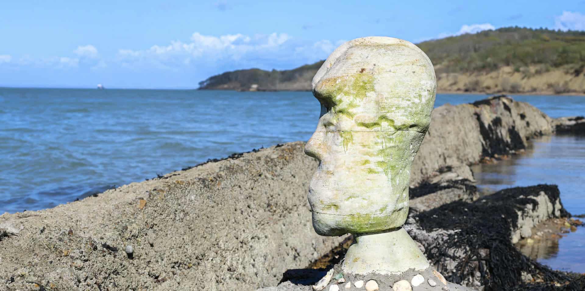 Mystery sculpture appears on Bouldnor Beach cemented to WW2 remains