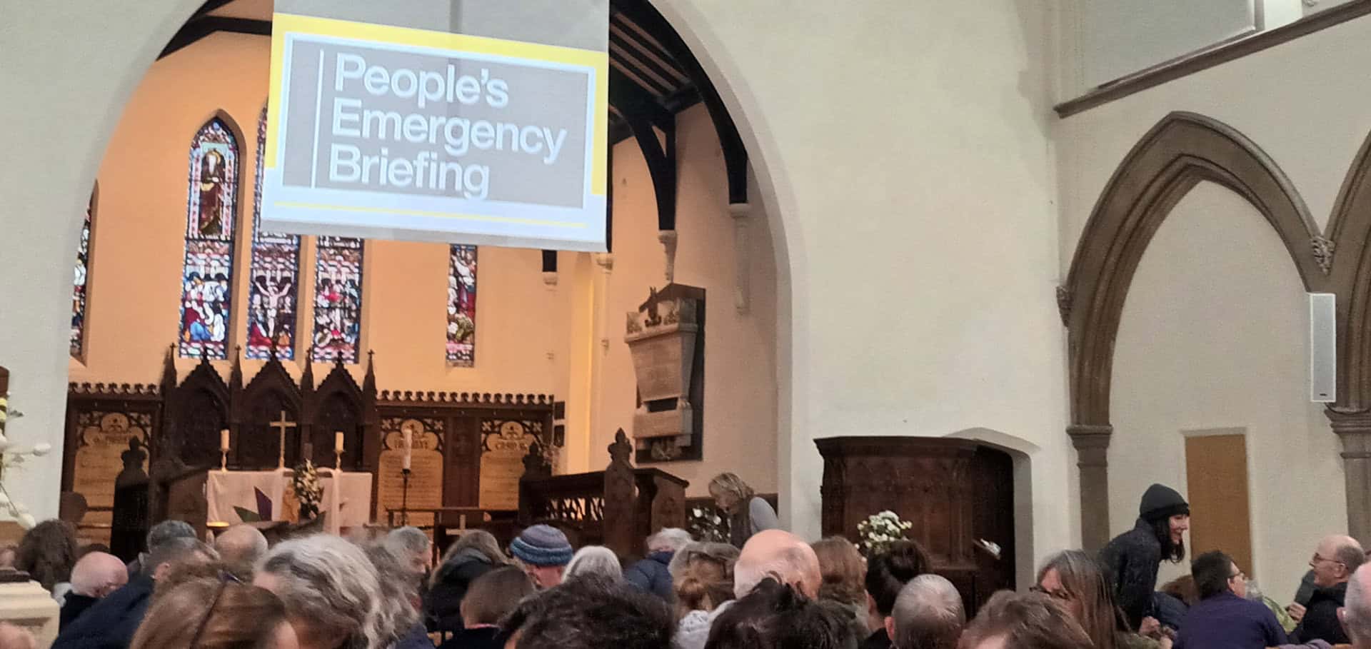 the screen at st catherine's church showing the emergency briefing