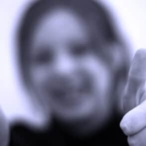 woman with thumbs up