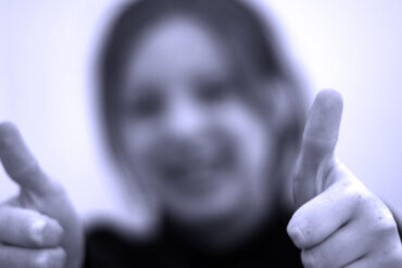 woman with thumbs up