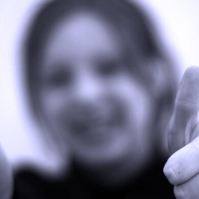 woman with thumbs up