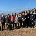 Yokogawa Marex team members on Gurnard beach after the beach clean