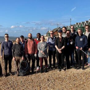 Yokogawa Marex team members on Gurnard beach after the beach clean