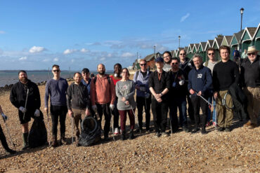 Yokogawa Marex team members on Gurnard beach after the beach clean