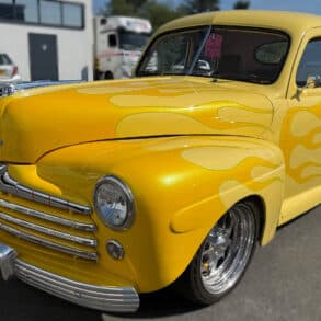 Bright yellow Hot Rod in Aldi car park