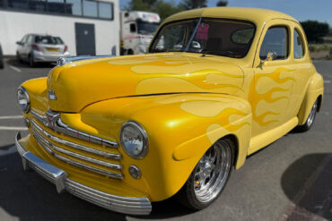 Bright yellow Hot Rod in Aldi car park