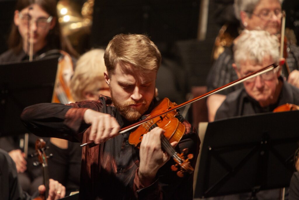 charlie lovell-jones playing at iwso concert in May 2026