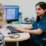 GP giving consultation to patient