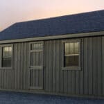 Portable building sitting on gravel