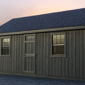 Portable building sitting on gravel