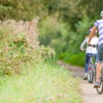 Family cycling on yhe Red Squirrel Trail