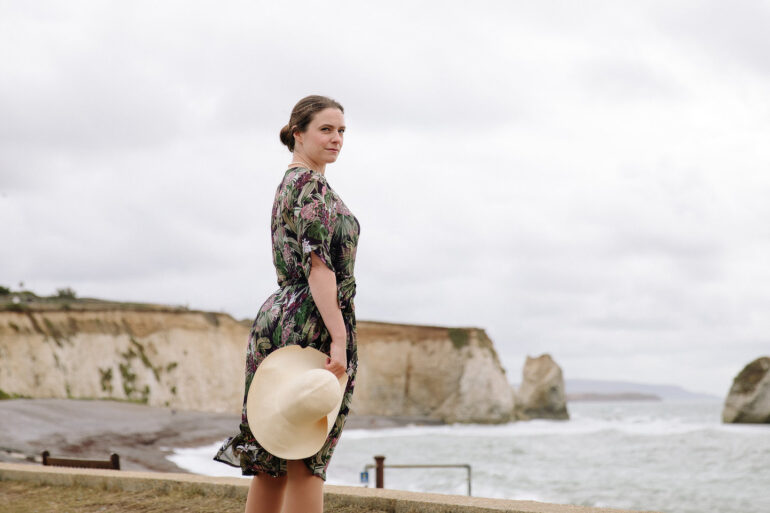 Actress playing Virginia Woolf overlooking Freshwater Bay
