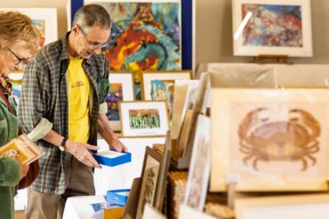 people looking at art during open studios