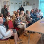 People attending the public meeting at memorial hall